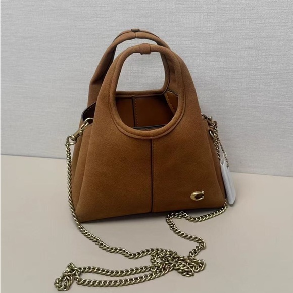 Coach Handbags - Coach Tan Mini Bag with Gold Chain